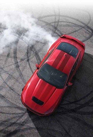 Overhead view of a 2024 Ford Mustang® model with tire tracks on pavement | Weakley County Motors, Inc. in Martin TN